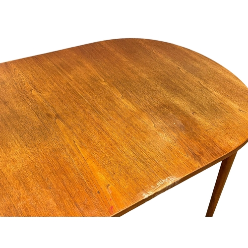 1029 - A Swedish Mid Century teak ‘Ove’ dining table designed by Nils Jonsson for Hugo Troeds. 1960’s. 155x... 