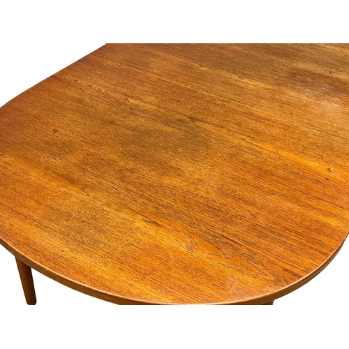 1029 - A Swedish Mid Century teak ‘Ove’ dining table designed by Nils Jonsson for Hugo Troeds. 1960’s. 155x... 