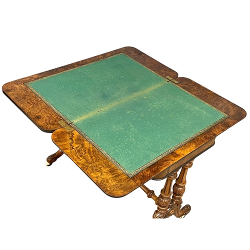 1037 - A good quality Victorian Burr Walnut turnover games table with stretcher support on Cabriole legs. C... 