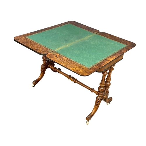 1037 - A good quality Victorian Burr Walnut turnover games table with stretcher support on Cabriole legs. C... 