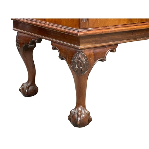 1056 - An early 20th century Chippendale Revival mahogany sideboard on Ball & Claw feet. 152x51x127cm (8)