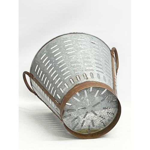 234 - A French galvanised olive basket. 45x40x44cm