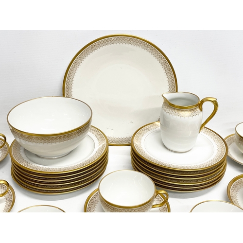 187 - A 39 piece William Guérin Limoges early 20th century gilt porcelain tea set. Circa 1920-1932.