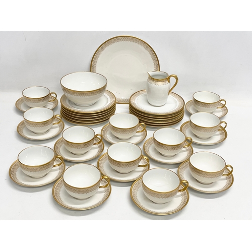 187 - A 39 piece William Guérin Limoges early 20th century gilt porcelain tea set. Circa 1920-1932.