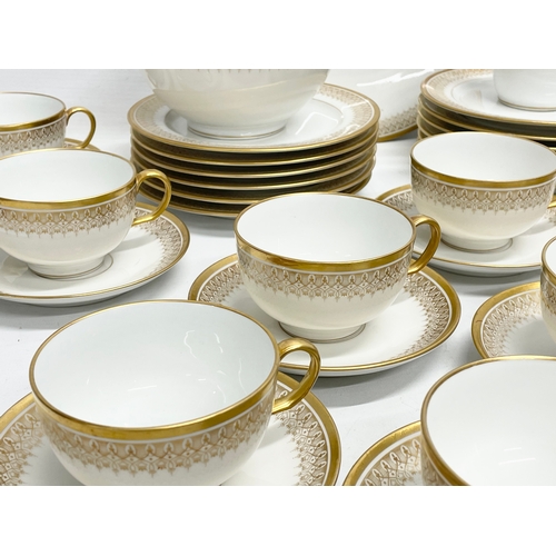 187 - A 39 piece William Guérin Limoges early 20th century gilt porcelain tea set. Circa 1920-1932.