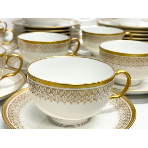 187 - A 39 piece William Guérin Limoges early 20th century gilt porcelain tea set. Circa 1920-1932.