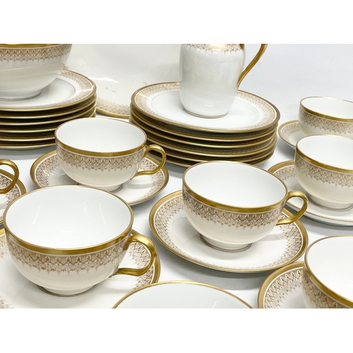 187 - A 39 piece William Guérin Limoges early 20th century gilt porcelain tea set. Circa 1920-1932.