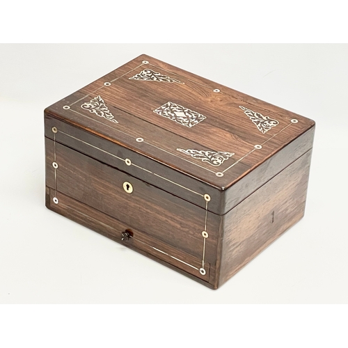 148 - A Victorian rosewood vanity box with Mother of Pearl inlay and cut glass bottles with silver plated ... 