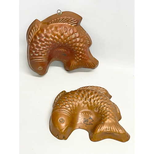 272 - A pair of large early 20th century copper jelly moulds. 28cm