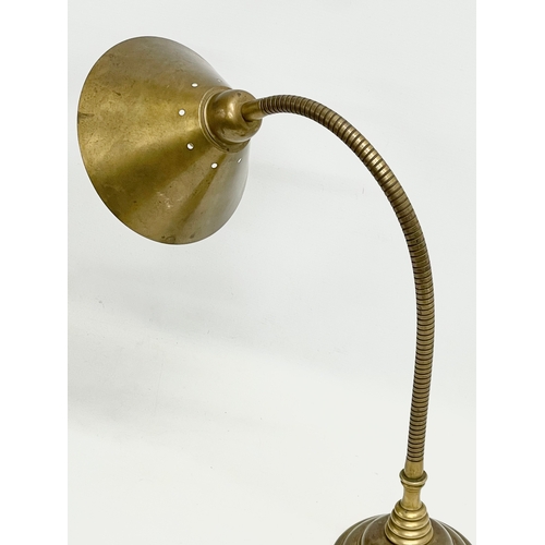 154 - A large brass swan neck desk lamp.