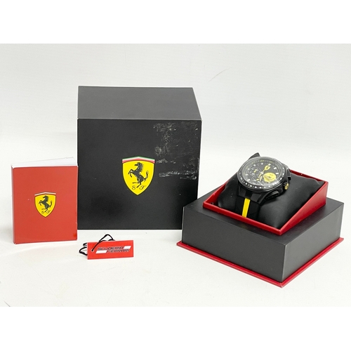 437 - A Scuderia Ferrari watch with box.