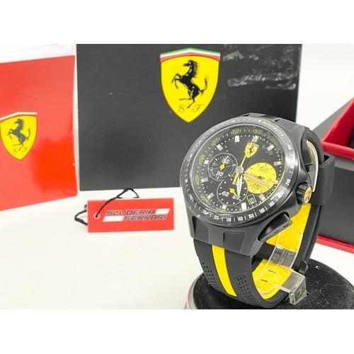 437 - A Scuderia Ferrari watch with box.