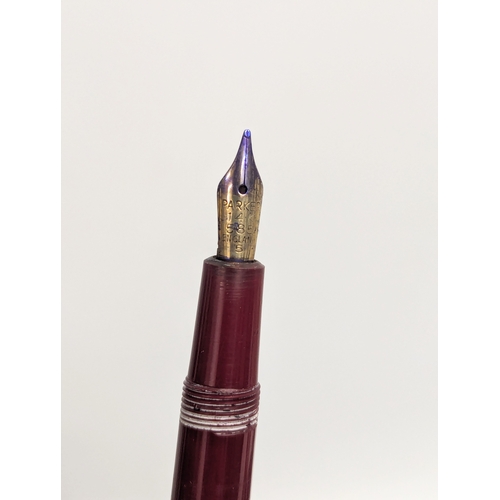 457 - A 14ct gold nibbed Parker fountain pen.