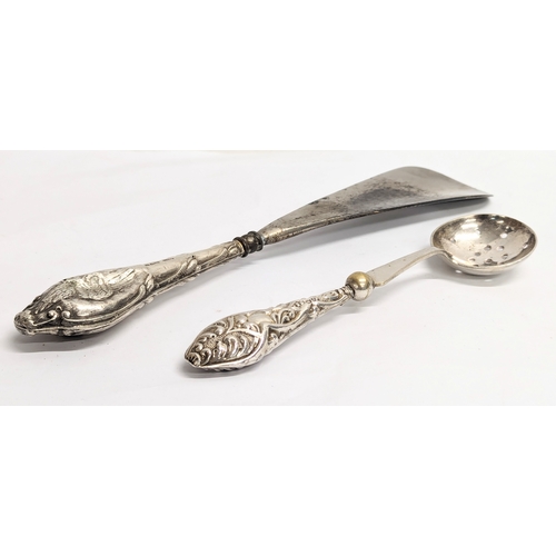 460 - An early 20th century silver handled shoehorn and sieve spoon.