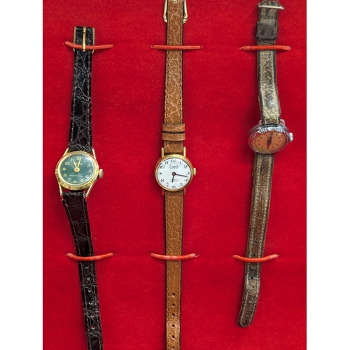 471 - A collection of vintage ladies and gents watches in case