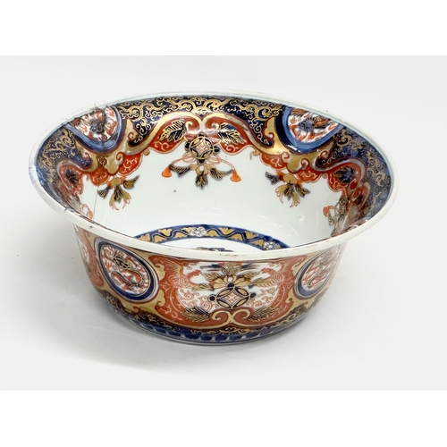 26 - A 19th century Japanese Imari and gilt bowl. 4 character mark. 22x9cm