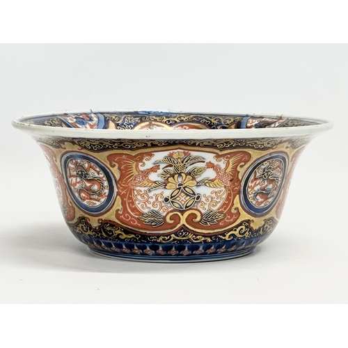 26 - A 19th century Japanese Imari and gilt bowl. 4 character mark. 22x9cm