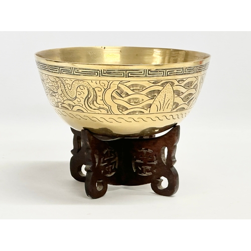 157 - An early 20th century Chinese brass bowl on stand. 1900. 18.5x8.5cm