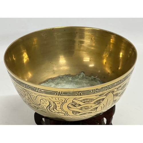 157 - An early 20th century Chinese brass bowl on stand. 1900. 18.5x8.5cm