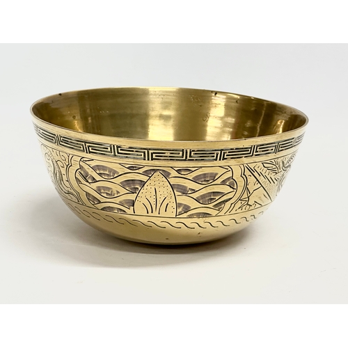 157 - An early 20th century Chinese brass bowl on stand. 1900. 18.5x8.5cm