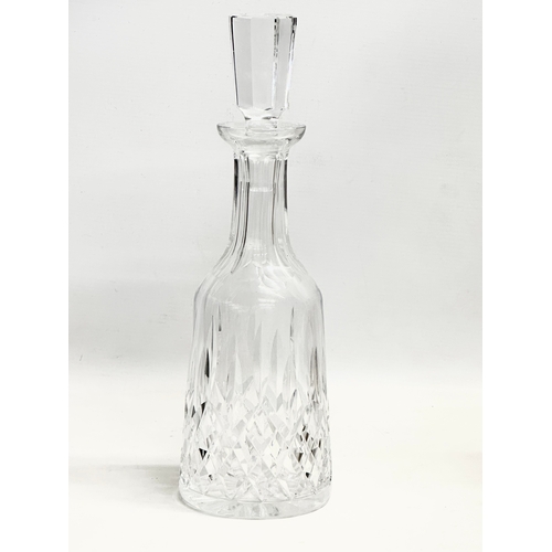 88 - A tall Waterford Crystal ‘Lismore’ decanter and stopper. 33cm