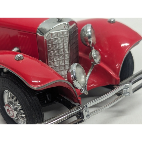 548 - 2 Franklin Mint model cars, '1935 Mercedes Benz 500K Special Roadster,' and '1938 Rolls Royce Phanto... 