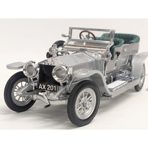 550 - A 1986 Franklin Mint Precision Model of 'The 1907 Rolls-Royce Silver Ghost.' 20cm