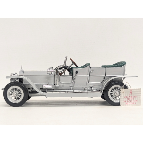 550 - A 1986 Franklin Mint Precision Model of 'The 1907 Rolls-Royce Silver Ghost.' 20cm