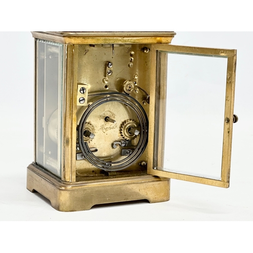 49 - A good quality late 19th century Kands brass carriage clock with case and key. Clock measures 9.5x8.... 