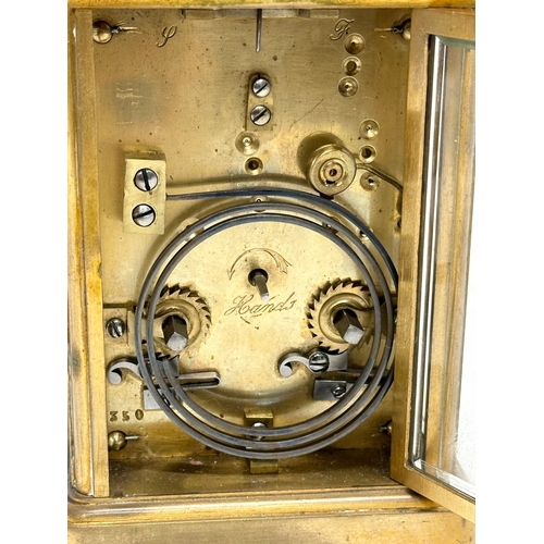 49 - A good quality late 19th century Kands brass carriage clock with case and key. Clock measures 9.5x8.... 