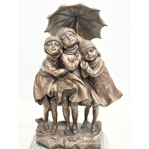 61 - A good quality bronze ‘Girls in the Rain’ figure on marble base. In the manner of DH Chiparus. 19x12... 