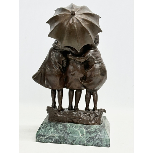 61 - A good quality bronze ‘Girls in the Rain’ figure on marble base. In the manner of DH Chiparus. 19x12... 