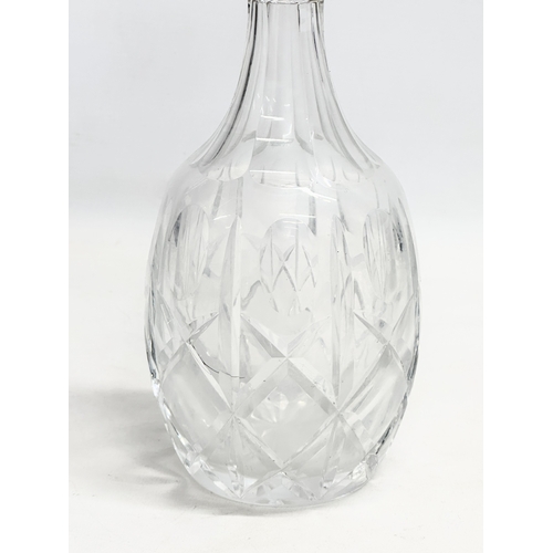 475 - A silver mounted crystal decanter. 30.5cm