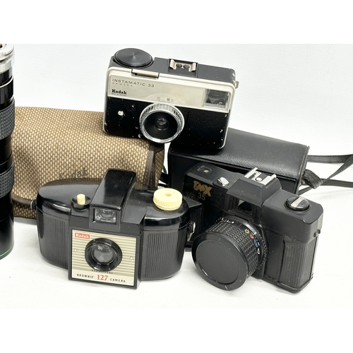 380 - 3 vintage cameras and a Hanimex lens with case. Kodak Brownie 127 Camera with case, Kodak Instamatic... 