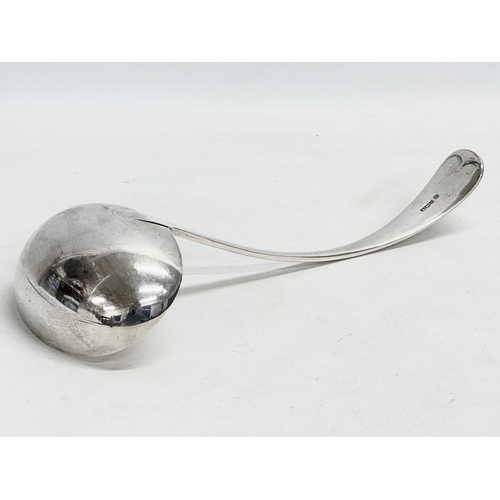 481 - A large heavy silver ladle. Sheffield, 1919. 300 grams. 31cm