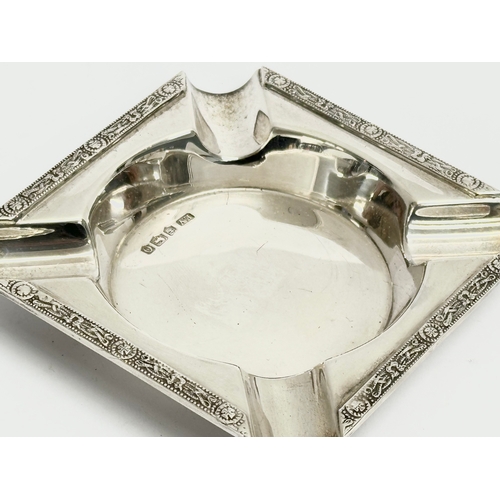 489 - An ornate silver ashtray. Sheffield, 1931. 96 grams. 9x9cm