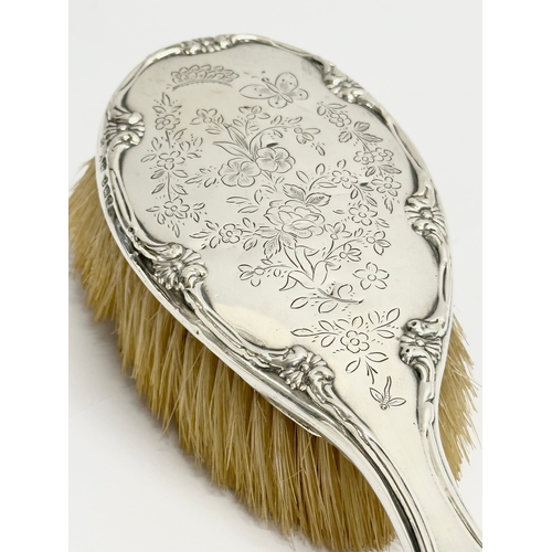 491 - A silver hair brush. Birmingham, 1907. 25cm