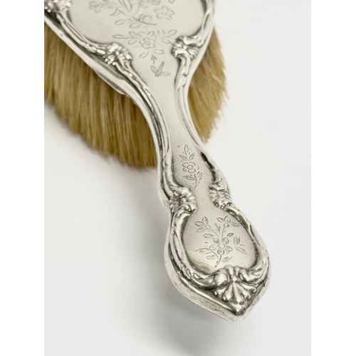 491 - A silver hair brush. Birmingham, 1907. 25cm