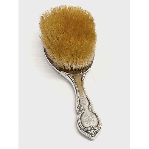 491 - A silver hair brush. Birmingham, 1907. 25cm