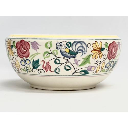 104 - A large Art Deco Poole Pottery bowl designed by Truda Carter and John Adams. 24x11cm