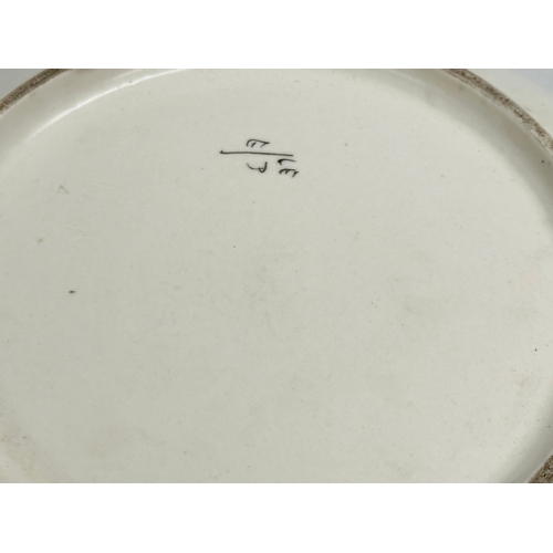 104 - A large Art Deco Poole Pottery bowl designed by Truda Carter and John Adams. 24x11cm