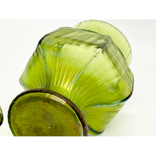 64 - A pair of late 19th/early 20th century Loetz style Iridescent glass vases. Circa 1900. 10x13cm