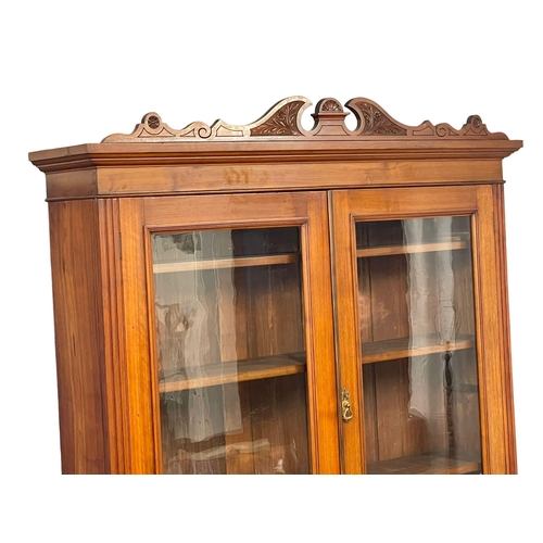 843 - A large late Victorian walnut secretaire bookcase with aesthetic movement. Circa 1880. 153x51x250cm ... 