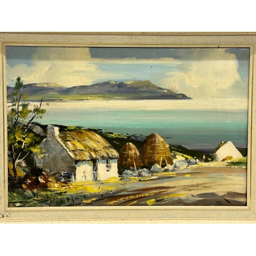 203 - An oil painting on canvas by Patric Colhoun (Patrick Colhoun) Rossbeg Cottages. 60x40cm. Frame 70x50... 