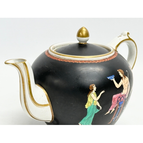 111 - A Victorian Staffordshire Neoclassical style and gilt teapot. 21x14x14cn