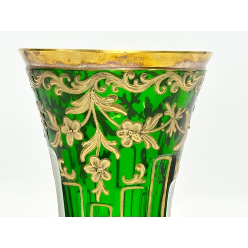 175 - An early/mid 20th century Bohemian Glass Moser style vase with painted flower, gilt decoration and b... 