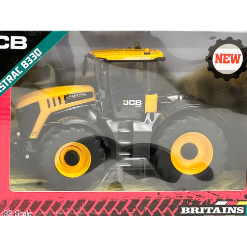 576 - An unused Britains JCB Fastrac 8330 tractor in box. 1:32 scale. Die-Cast Model. 25x13x15.5cm