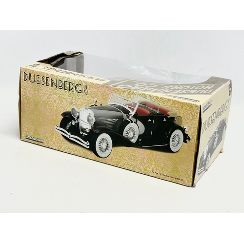 581 - A large Limited Edition Greenlight Duesenberg II SJ model car in box. 1:18 scale. 35x18.5x15cm