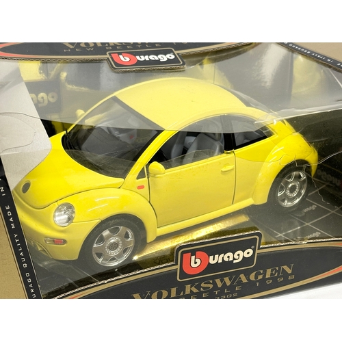 582 - 3 large Burago model cars in boxes. A Gold Collection Burago Volkswagen New Beatle 1998, 1/18 scale ... 