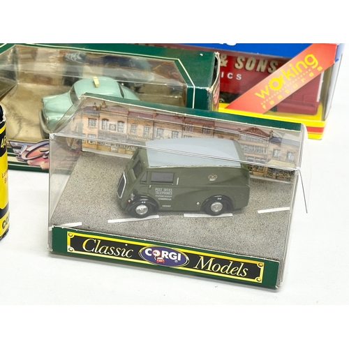 597 - A collection of Corgi models in boxes.